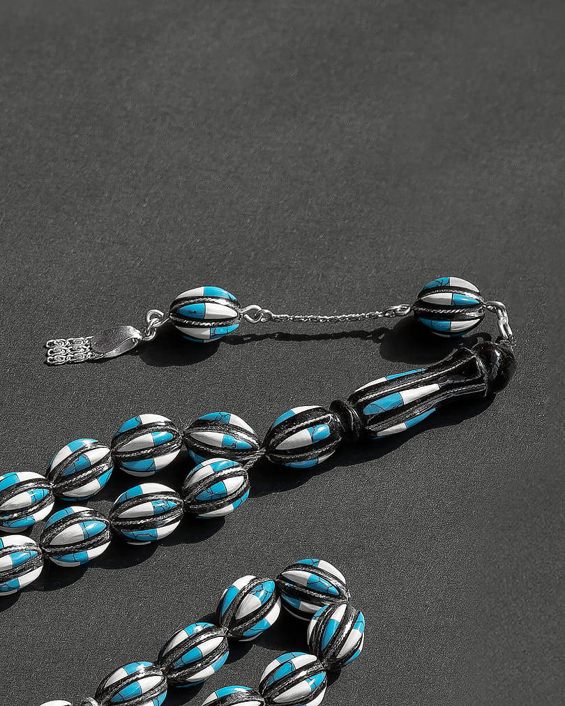 Silver rosary, similar to ivory and turquoise